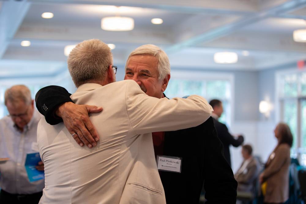 Retirees hugging